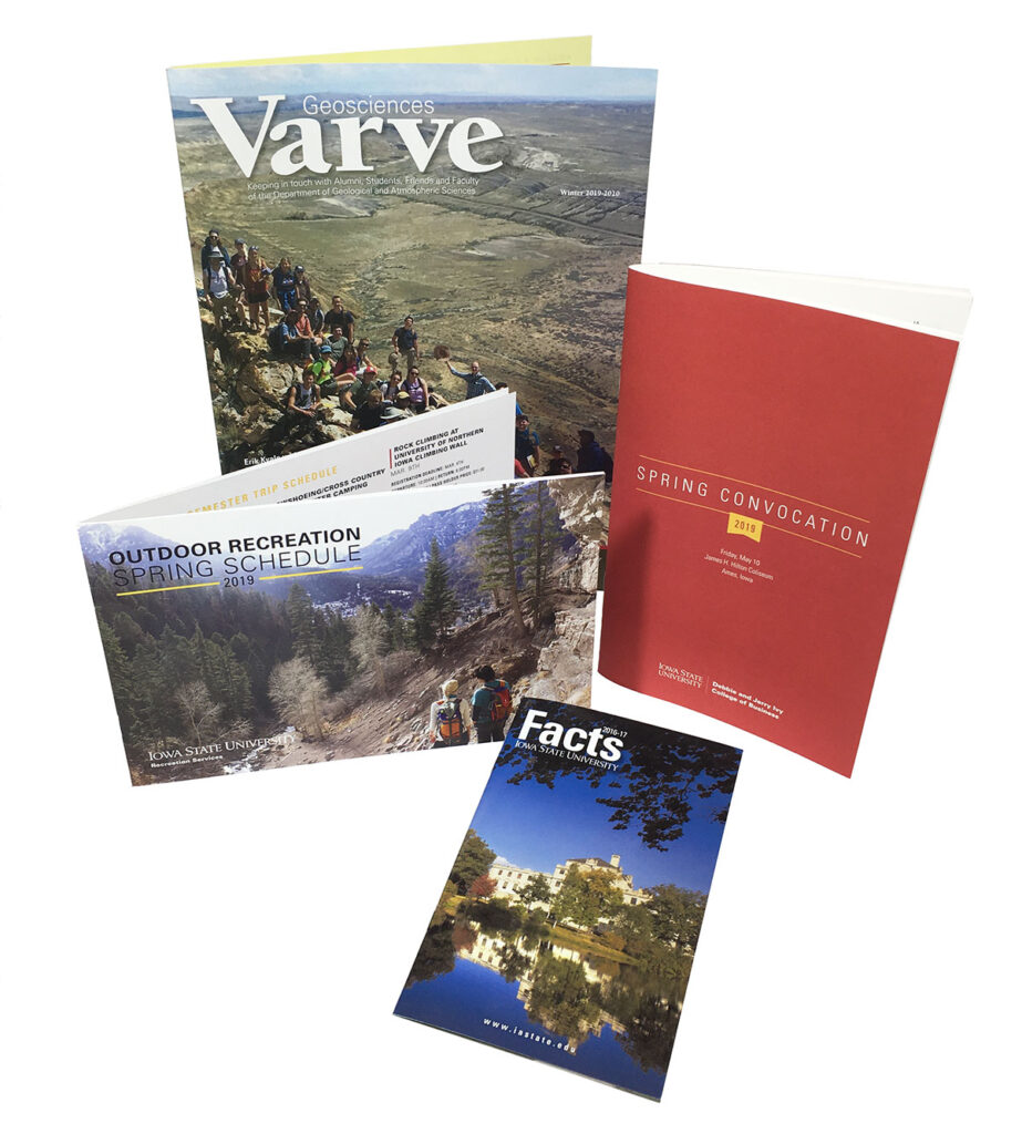 a grouping of saddle stitched books