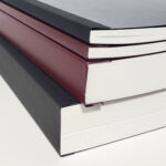 Image showing the soft-back options and colors. It shows a close up of the spine.