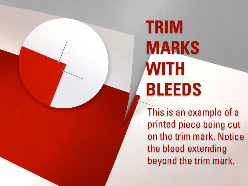 This graphic shows the trim marks and how they cut into the graphic.